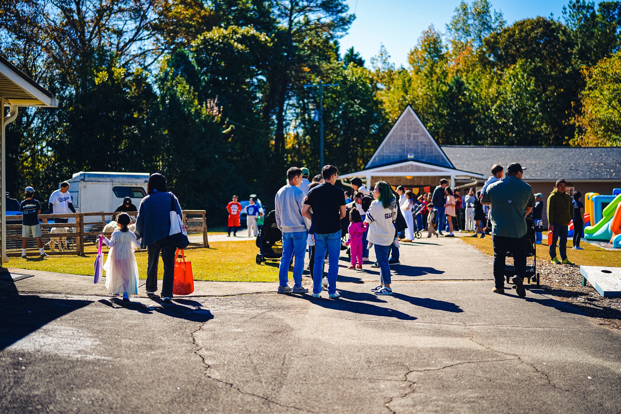 Families outside together at the fall festival